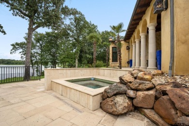 This exquisite waterfront Italian Villa sits on one acre in the on Cascades Golf Club in Texas - for sale on GolfHomes.com, golf home, golf lot