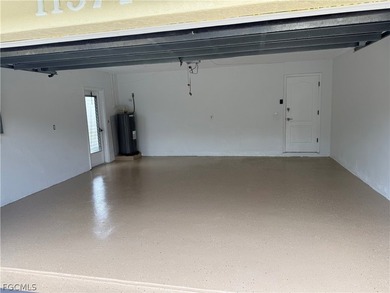 Spacious 3 bedroom 2 bath pool home in CAPE ROYAL, a gated golf on Royal Tee Country Club in Florida - for sale on GolfHomes.com, golf home, golf lot