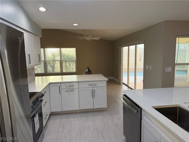 Spacious 3 bedroom 2 bath pool home in CAPE ROYAL, a gated golf on Royal Tee Country Club in Florida - for sale on GolfHomes.com, golf home, golf lot