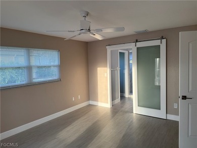 Spacious 3 bedroom 2 bath pool home in CAPE ROYAL, a gated golf on Royal Tee Country Club in Florida - for sale on GolfHomes.com, golf home, golf lot