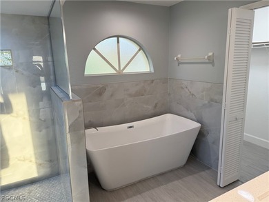 Spacious 3 bedroom 2 bath pool home in CAPE ROYAL, a gated golf on Royal Tee Country Club in Florida - for sale on GolfHomes.com, golf home, golf lot