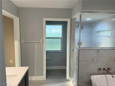 Spacious 3 bedroom 2 bath pool home in CAPE ROYAL, a gated golf on Royal Tee Country Club in Florida - for sale on GolfHomes.com, golf home, golf lot