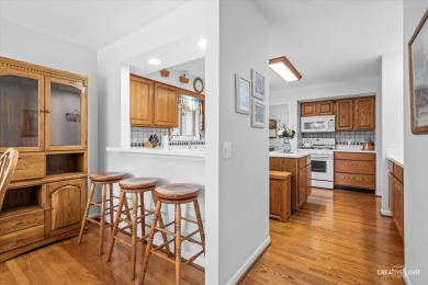 This stunning all-brick ranch home sits proudly on the 2nd tee on Blackberry Oaks Golf Course in Illinois - for sale on GolfHomes.com, golf home, golf lot