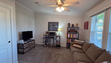 Nestled in the sought-after, gated 55+ community of Riverside on The Riverside Golf Club in Florida - for sale on GolfHomes.com, golf home, golf lot