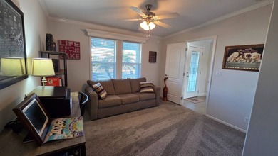 Nestled in the sought-after, gated 55+ community of Riverside on The Riverside Golf Club in Florida - for sale on GolfHomes.com, golf home, golf lot