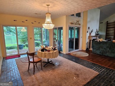 This 3 bed, 2 bath single-story home sits on the smaller fishing on Fairfield Plantation Golf and Country Club in Georgia - for sale on GolfHomes.com, golf home, golf lot