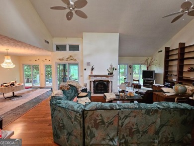 This 3 bed, 2 bath single-story home sits on the smaller fishing on Fairfield Plantation Golf and Country Club in Georgia - for sale on GolfHomes.com, golf home, golf lot