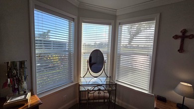 Nestled in the sought-after, gated 55+ community of Riverside on The Riverside Golf Club in Florida - for sale on GolfHomes.com, golf home, golf lot