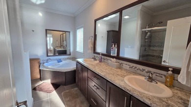 Nestled in the sought-after, gated 55+ community of Riverside on The Riverside Golf Club in Florida - for sale on GolfHomes.com, golf home, golf lot