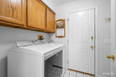 This stunning all-brick ranch home sits proudly on the 2nd tee on Blackberry Oaks Golf Course in Illinois - for sale on GolfHomes.com, golf home, golf lot