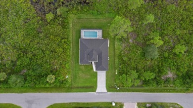 Welcome to your Florida dream home! This gorgeous newly built on Sabal Trace Golf and Country Club in Florida - for sale on GolfHomes.com, golf home, golf lot