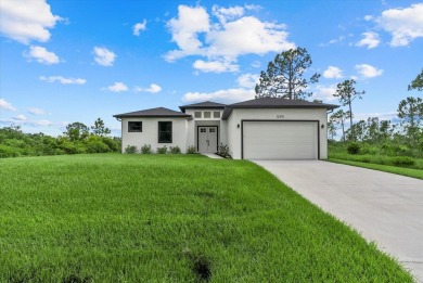 Welcome to your Florida dream home! This gorgeous newly built on Sabal Trace Golf and Country Club in Florida - for sale on GolfHomes.com, golf home, golf lot
