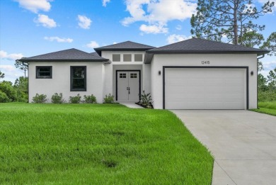 Welcome to your Florida dream home! This gorgeous newly built on Sabal Trace Golf and Country Club in Florida - for sale on GolfHomes.com, golf home, golf lot