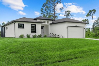 Welcome to your Florida dream home! This gorgeous newly built on Sabal Trace Golf and Country Club in Florida - for sale on GolfHomes.com, golf home, golf lot