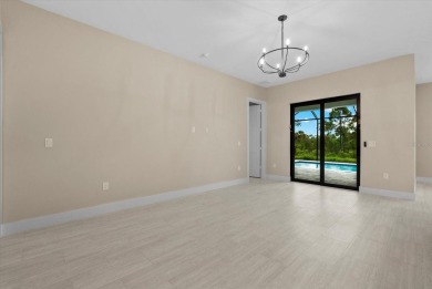 Welcome to your Florida dream home! This gorgeous newly built on Sabal Trace Golf and Country Club in Florida - for sale on GolfHomes.com, golf home, golf lot