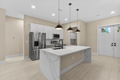 Welcome to your Florida dream home! This gorgeous newly built on Sabal Trace Golf and Country Club in Florida - for sale on GolfHomes.com, golf home, golf lot