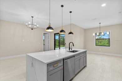 Welcome to your Florida dream home! This gorgeous newly built on Sabal Trace Golf and Country Club in Florida - for sale on GolfHomes.com, golf home, golf lot