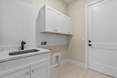 Welcome to your Florida dream home! This gorgeous newly built on Sabal Trace Golf and Country Club in Florida - for sale on GolfHomes.com, golf home, golf lot