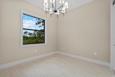 Welcome to your Florida dream home! This gorgeous newly built on Sabal Trace Golf and Country Club in Florida - for sale on GolfHomes.com, golf home, golf lot