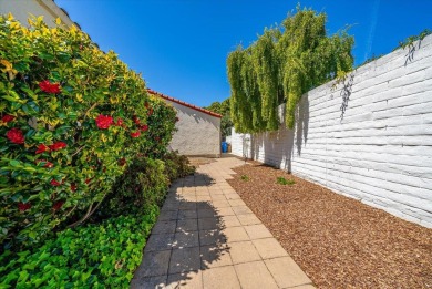 Discover tranquility and comfort in this charming single-level on Del Monte Golf Course in California - for sale on GolfHomes.com, golf home, golf lot