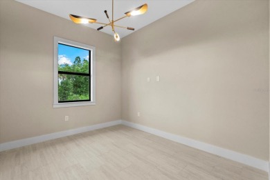 Welcome to your Florida dream home! This gorgeous newly built on Sabal Trace Golf and Country Club in Florida - for sale on GolfHomes.com, golf home, golf lot