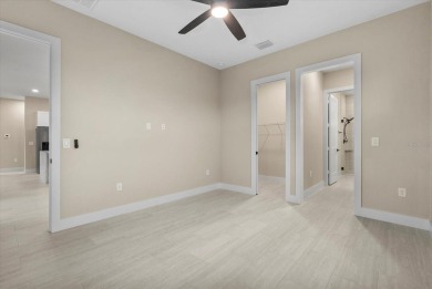 Welcome to your Florida dream home! This gorgeous newly built on Sabal Trace Golf and Country Club in Florida - for sale on GolfHomes.com, golf home, golf lot