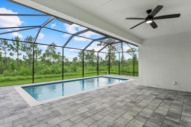 Welcome to your Florida dream home! This gorgeous newly built on Sabal Trace Golf and Country Club in Florida - for sale on GolfHomes.com, golf home, golf lot