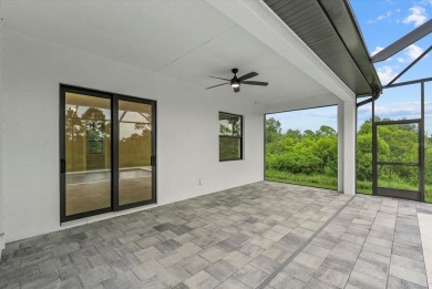 Welcome to your Florida dream home! This gorgeous newly built on Sabal Trace Golf and Country Club in Florida - for sale on GolfHomes.com, golf home, golf lot