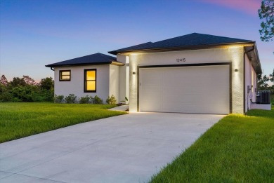 Welcome to your Florida dream home! This gorgeous newly built on Sabal Trace Golf and Country Club in Florida - for sale on GolfHomes.com, golf home, golf lot