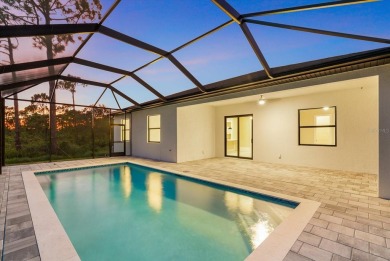 Welcome to your Florida dream home! This gorgeous newly built on Sabal Trace Golf and Country Club in Florida - for sale on GolfHomes.com, golf home, golf lot