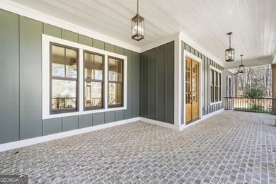 Like-new, immaculately maintained golf-course retreat - on Harbor Club Golf and Country Club in Georgia - for sale on GolfHomes.com, golf home, golf lot