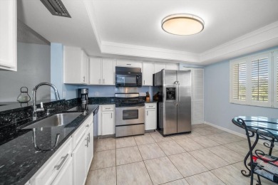 Enjoy Effortless Condo Living with Golf Course Views! Welcome to on East Bay Golf Club in Florida - for sale on GolfHomes.com, golf home, golf lot
