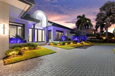 Exquisitely updated 4-bedroom, 4.5 bath estate home with on Stonebridge Golf and Country Club in Florida - for sale on GolfHomes.com, golf home, golf lot