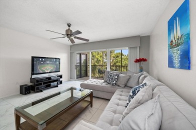Enjoy Effortless Condo Living with Golf Course Views! Welcome to on East Bay Golf Club in Florida - for sale on GolfHomes.com, golf home, golf lot