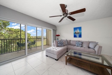 Enjoy Effortless Condo Living with Golf Course Views! Welcome to on East Bay Golf Club in Florida - for sale on GolfHomes.com, golf home, golf lot