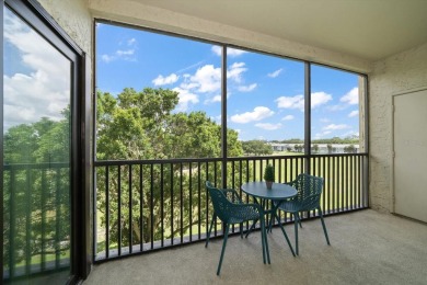 Enjoy Effortless Condo Living with Golf Course Views! Welcome to on East Bay Golf Club in Florida - for sale on GolfHomes.com, golf home, golf lot
