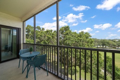 Enjoy Effortless Condo Living with Golf Course Views! Welcome to on East Bay Golf Club in Florida - for sale on GolfHomes.com, golf home, golf lot