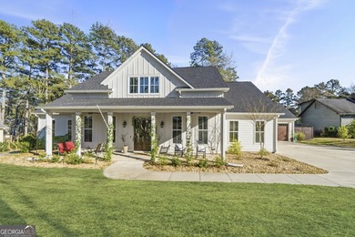 Experience the elegance of this stunning Craftsman-style on Milledgeville Country Club in Georgia - for sale on GolfHomes.com, golf home, golf lot