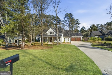 Experience the elegance of this stunning Craftsman-style on Milledgeville Country Club in Georgia - for sale on GolfHomes.com, golf home, golf lot
