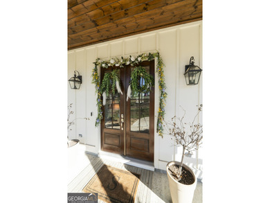 Experience the elegance of this stunning Craftsman-style on Milledgeville Country Club in Georgia - for sale on GolfHomes.com, golf home, golf lot