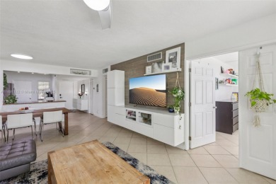 Beautifully updated 2 bed, 2 bath first-floor condo with on Palm-Aire Country Club and Resort - Palms in Florida - for sale on GolfHomes.com, golf home, golf lot