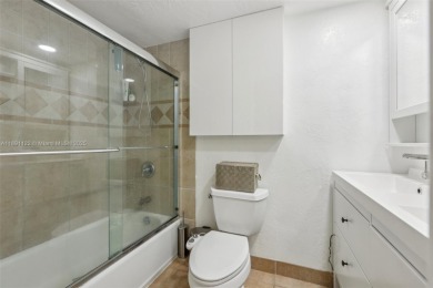 Beautifully updated 2 bed, 2 bath first-floor condo with on Palm-Aire Country Club and Resort - Palms in Florida - for sale on GolfHomes.com, golf home, golf lot