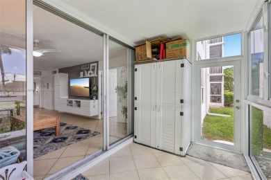 Beautifully updated 2 bed, 2 bath first-floor condo with on Palm-Aire Country Club and Resort - Palms in Florida - for sale on GolfHomes.com, golf home, golf lot