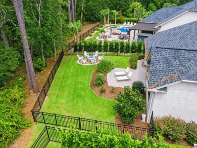 Come see this stunning custom-built, all-brick home in one of on The Dunes Golf and Beach Club in South Carolina - for sale on GolfHomes.com, golf home, golf lot