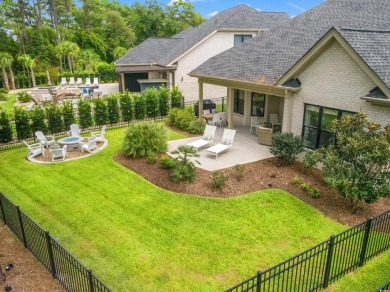 Come see this stunning custom-built, all-brick home in one of on The Dunes Golf and Beach Club in South Carolina - for sale on GolfHomes.com, golf home, golf lot