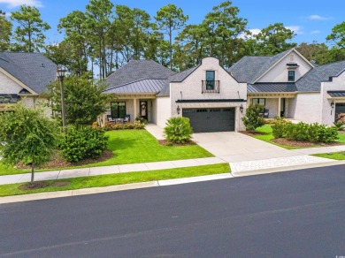 Come see this stunning custom-built, all-brick home in one of on The Dunes Golf and Beach Club in South Carolina - for sale on GolfHomes.com, golf home, golf lot