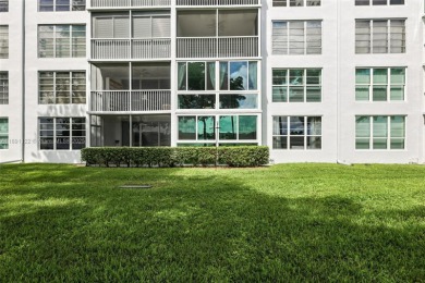 Beautifully updated 2 bed, 2 bath first-floor condo with on Palm-Aire Country Club and Resort - Palms in Florida - for sale on GolfHomes.com, golf home, golf lot