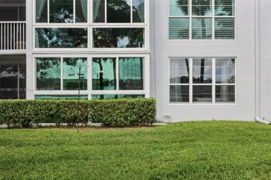Beautifully updated 2 bed, 2 bath first-floor condo with on Palm-Aire Country Club and Resort - Palms in Florida - for sale on GolfHomes.com, golf home, golf lot