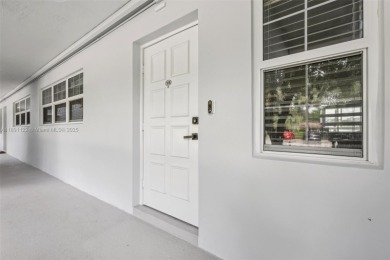 Beautifully updated 2 bed, 2 bath first-floor condo with on Palm-Aire Country Club and Resort - Palms in Florida - for sale on GolfHomes.com, golf home, golf lot