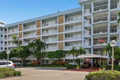Beautifully updated 2 bed, 2 bath first-floor condo with on Palm-Aire Country Club and Resort - Palms in Florida - for sale on GolfHomes.com, golf home, golf lot